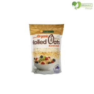 Organic Rolled Oats in a bowl with fresh fruits and nuts